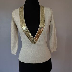 Chic Cream V-Neck Sweater with Gold Sequin Accents